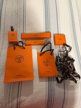 Various Hermes bags, boxes and ribbon